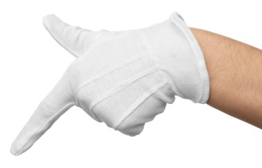 Kumaş eldivenli kadın beyaz arka plandaki bir şeyi işaret ediyor, yakın plan.