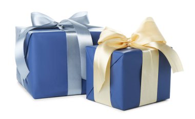 Beautiful gift boxes with bows isolated on white
