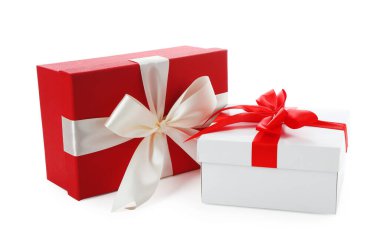 Beautiful gift boxes with bows isolated on white