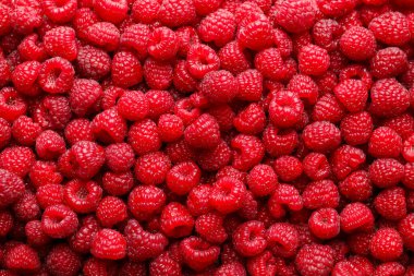 Arka plan olarak taze ahududu, üst manzara