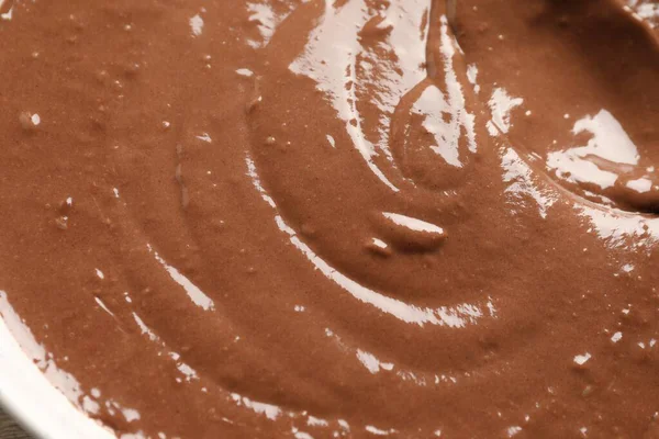 Sıvı çikolata hamurunun dokusu arka plan olarak, üst görünüm