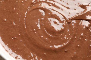 Sıvı çikolata hamurunun dokusu arka plan olarak, üst görünüm