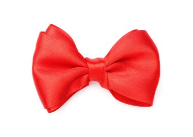 Kırmızı kurdeleyle yapılmış güzel bir fiyonk. Beyaz, üst manzara.