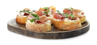 Krem peynirli, jambonlu ve roka soslu nefis bruschettalar.