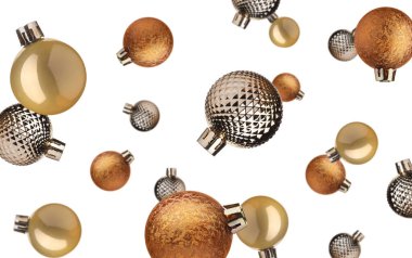 Noel topları beyaz arka planda havada uçuşuyor. Şenlikli süsler