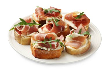 Krem peynirli, jambonlu ve roka soslu nefis bruschettalar.