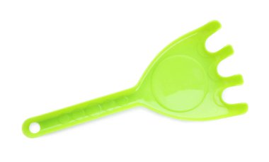 Plastik tırmık beyazda izole edilmiş, üst manzara. Çocukların plaj oyuncağı.