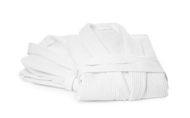 İki yumuşak waffle bornozu beyaza izole edilmiş.