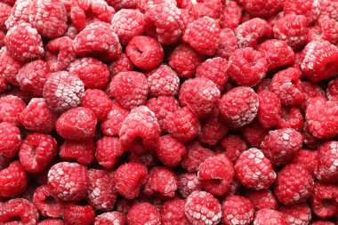 Arka plan olarak donmuş olgun ahududular, üst görünüm