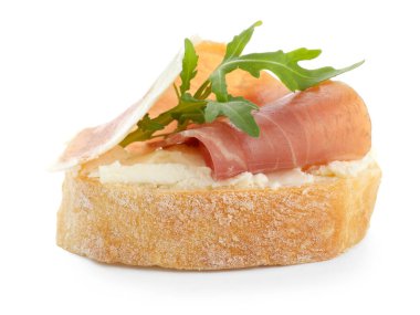 Krem peynirli, jambonlu ve roka soslu nefis bruschetta.