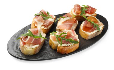 Krem peynirli, jambonlu ve roka soslu nefis bruschettalar.