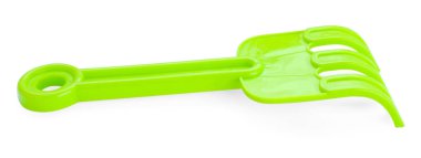 Plastik tırmık beyazda izole edilmiş. Çocukların plaj oyuncağı.