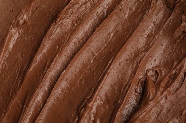 Arka plan olarak lezzetli eritilmiş çikolata, üst manzara