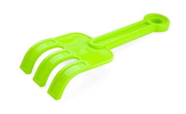 Plastik tırmık beyazda izole edilmiş. Çocukların plaj oyuncağı.
