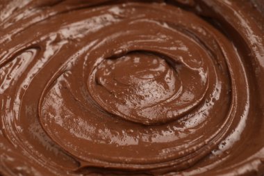 Arkaplan olarak lezzetli erimiş çikolata, yakın çekim görünümü