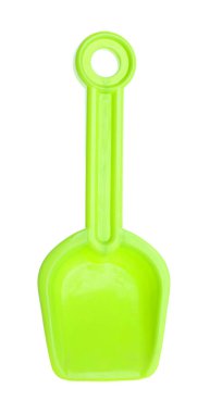 Açık yeşil plastik kürek beyaza izole edilmiş. Çocukların plaj oyuncağı.