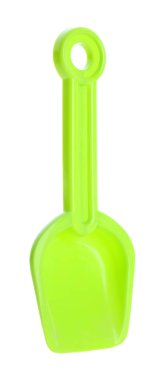 Açık yeşil plastik kürek beyaza izole edilmiş. Çocukların plaj oyuncağı.