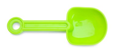 Plastik kürek beyaza izole edilmiş, üst manzara. Çocukların plaj oyuncağı.