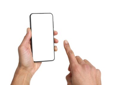 Man holding smartphone with blank screen on white background, closeup. Mockup for design