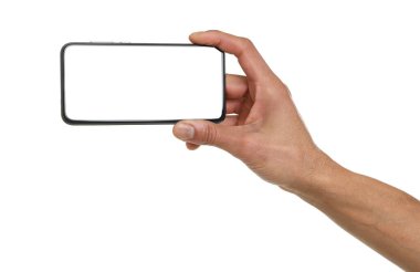 Man holding smartphone with blank screen on white background, closeup. Mockup for design