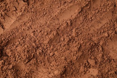 Arka plan olarak doğal kakao tozu, üst görünüm