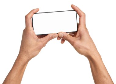 Man holding smartphone with blank screen on white background, closeup. Mockup for design