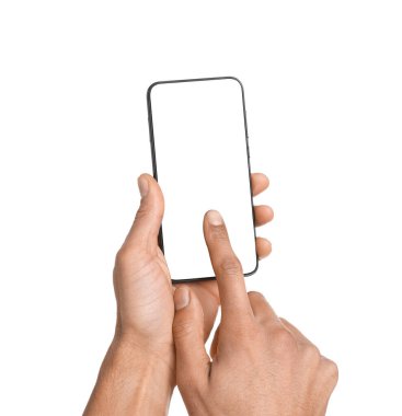 Man holding smartphone with blank screen on white background, closeup. Mockup for design