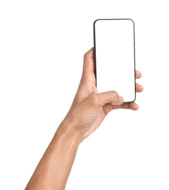 Man holding smartphone with blank screen on white background, closeup. Mockup for design