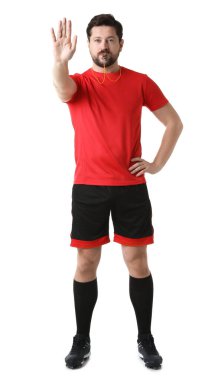 Hakem düdüğü çalıyor ve beyaz arkaplanda dur işareti gösteriyor