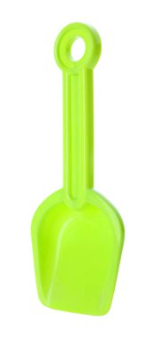 Açık yeşil plastik kürek beyaza izole edilmiş. Çocukların plaj oyuncağı.