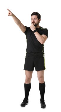 Hakem düdüğü çalıyor ve beyaz arkaplanı işaret ediyor