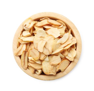 Beyaz tenceredeki kurutulmuş sarımsak taneleri.