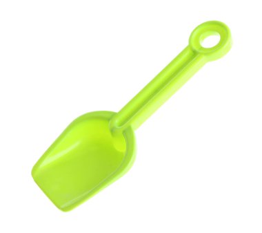 Açık yeşil plastik kürek beyaza izole edilmiş. Çocukların plaj oyuncağı.