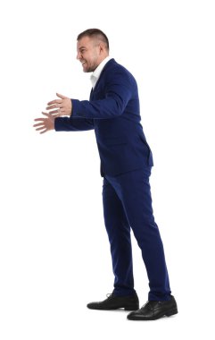 Beyaz arka plan üzerinde poz işadamı portresi tam uzunlukta