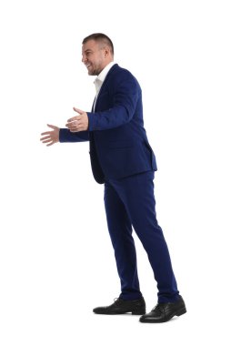 Beyaz arka plan üzerinde poz işadamı portresi tam uzunlukta