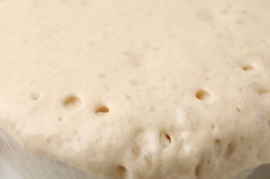 Fresh yeast dough as background, closeup view