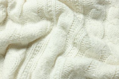 Arka plan olarak beyaz örülmüş kumaşın dokusu, üst görünüm