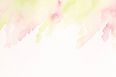 Beyaz kağıt üzerinde soyut suluboya resim, üst görünüm. Metin için boşluk