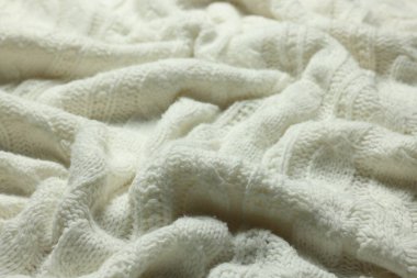 Arka plan olarak beyaz örülmüş kumaşın dokusu, yakın plan