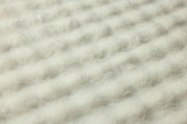 Arkaplan olarak beyaz kabarık kumaş dokusu, yakın plan