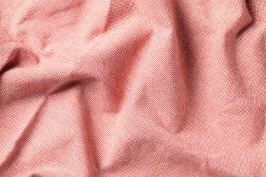 Arka plan olarak pembe kumaşın dokusu, üst görünüm
