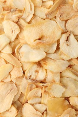 Arka plan olarak kurutulmuş sarımsak taneleri, üst görünüm