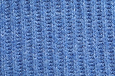 Arka plan olarak mavi örülmüş kumaşın dokusu, üst görünüm