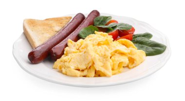 Lezzetli bir kahvaltı. Sosisli, domatesli, ıspanaklı ve kızarmış ekmekli leziz omlet.