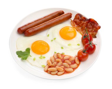 Geleneksel İngiliz kahvaltısı. Lezzetli, güneşli tarafı domuz pastırması, sosis, kırmızı fasulye ve domatesli yumurta.