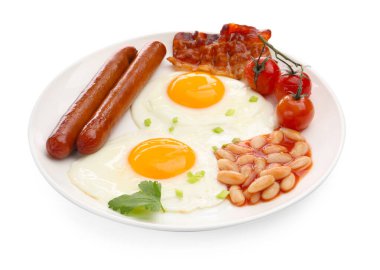 Geleneksel İngiliz kahvaltısı. Lezzetli, güneşli tarafı domuz pastırması, sosis, kırmızı fasulye ve domatesli yumurta.