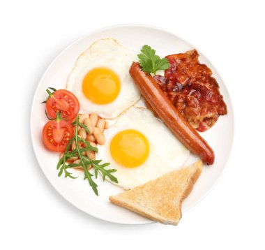 Geleneksel İngiliz kahvaltısı. Pastırmalı, sosisli, kırmızı fasulyeli, domatesli ve kızarmış ekmekli nefis, güneşli yumurtalar.