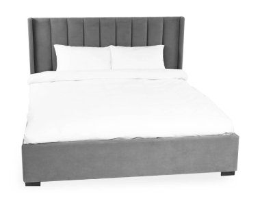 Beyaz çarşaflı büyük bir yatak.