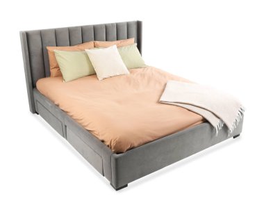 Beyaz çarşaflı büyük bir yatak.