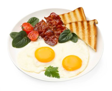 Yağda yumurta, pastırma, ıspanak, domates ve beyaz ekmek dilimleriyle nefis bir kahvaltı.